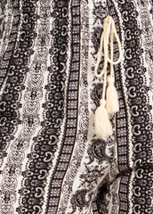 Wholesale Womens Rayon Challis Smocked Waist Paperbag Shorts With Tassel Tie Detail - Black & White Boho Paisley Print